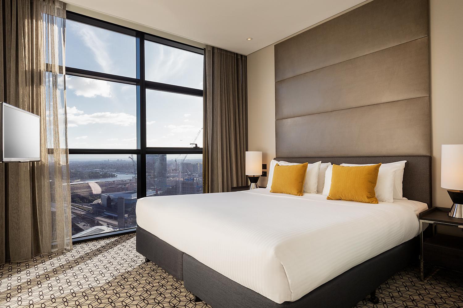 Fraser Suites Sydney Exteriör bild A bedroom at the Hilton London West End